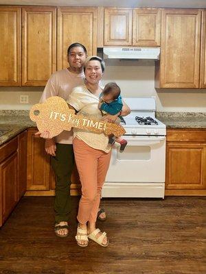 Our family in the kitchen of our first home!