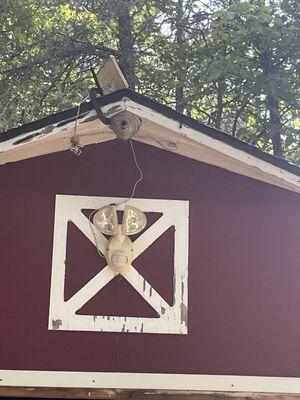 Before the battle! Beehive at the top of roof eave.