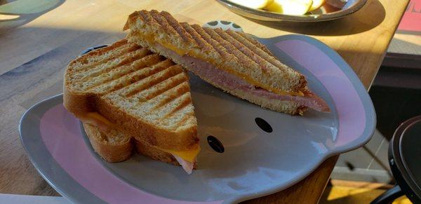 The kids grilled cheese with ham.