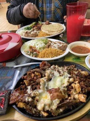 I ate Alambres and my husband had the Barbacoa plate. Came with tortillas and we chose corn vs. flour tortillas. Horchata to drink.