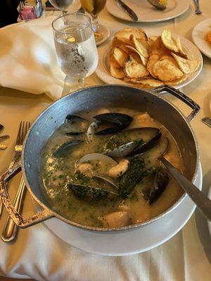 Seafood casserole in green sauce