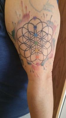 My flower of life artist is KEITH SMITH...