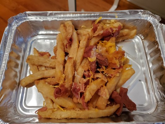 Crazy Fries - sausage, cheese, bacon. Even tho this is a next day left over pic, this is what is looked like being served "fresh" to me...