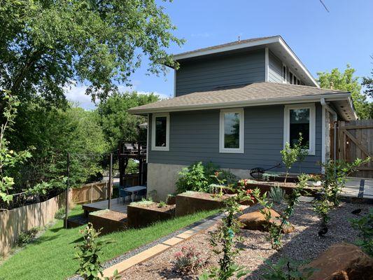 Tiered garden beds with steps out of steel.