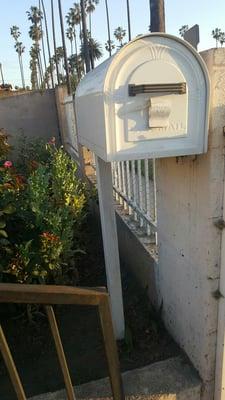 Mailbox from Home Depot and he did the welding of the box to the post and the post is encased in cement in my garden