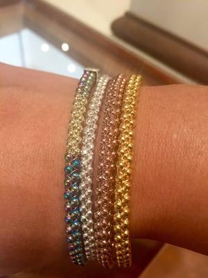 Love these beautiful bracelets designed by her son!