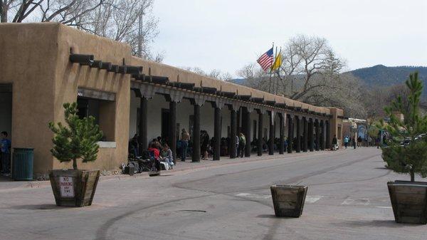 Native Americans selling under the Portal at the Palace of the Governors on The Plaza in Santa Fe, New Mexico