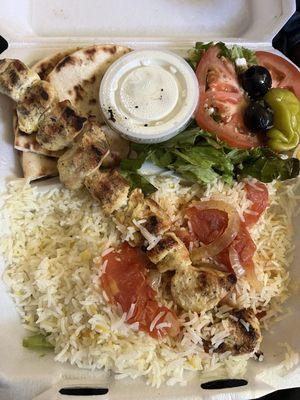 Chicken kabob plate with rice