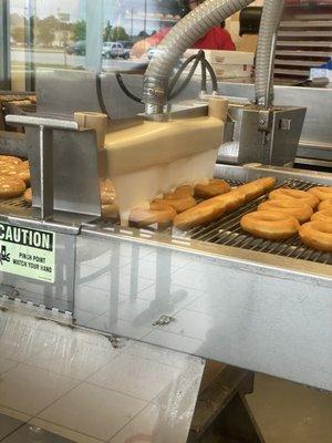 Frosting the donuts