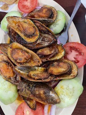 Mussels, cucumbers, red onions and tomatoes