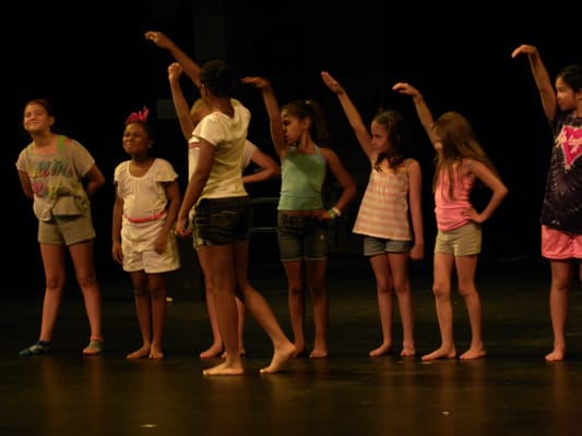 Performing Arts is perfect for kids who love to sign, dance, and act!