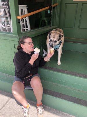 Dog eating pup cone