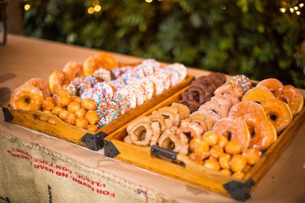 We served Happy's donuts for dessert at our wedding. We ordered 11 dozen and every single one was gone by the end of the night.