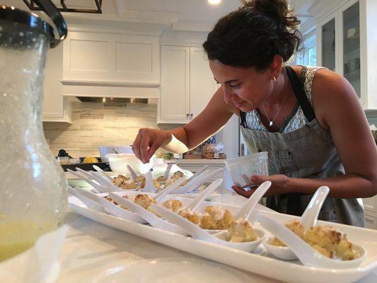 Plating my signature bite:  Roasted Cauliflower with Tahini Sauce and Dehydrated onion dust