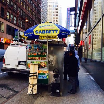 Food cart at southeast corner of E 38th and 7th Ave