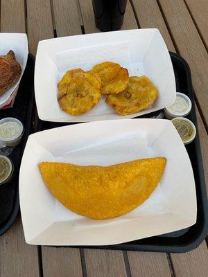 Fried shrimp empanada and fried tostones