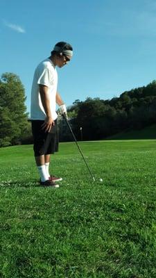 Teaching a buddy how to golf