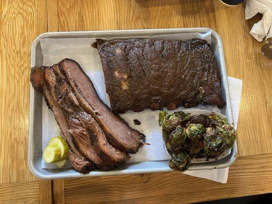 Briskets, ribs (kinda dried out), and roasted brussel sprouts.