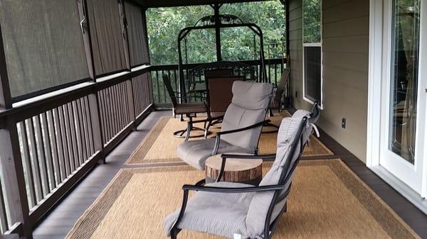 Enjoy the out doors from our screened in porch without the insects, also we have installed solar shades to block out the sun.