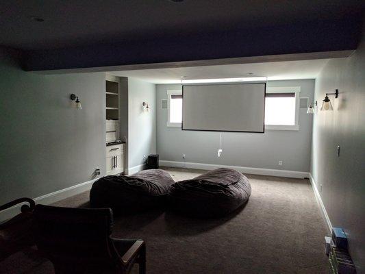 Home theater install with automated lighting, blinds and A/V equipment.