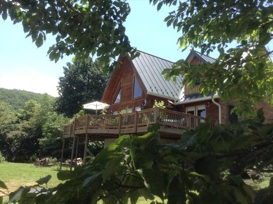 The back deck, a great place to relax. Enjoy the view, mountains during the day & stars at night.  And the local wildlife.