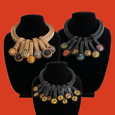 Chunky leather, Tuareg-inspired necklaces with Ghana Krobo glass beads.