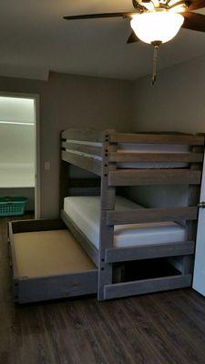 A beautiful twin twin stackable Bunk bed with a Huge storage drawer.