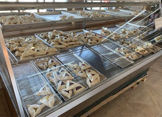 Hamantaschen - raspberry, cherry, apricot, lemon, poppy, prune, chocolate, etc. Mini, medium, and jumbo sizes available. Purim time.