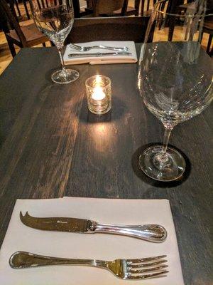 Place setting with cheese knife