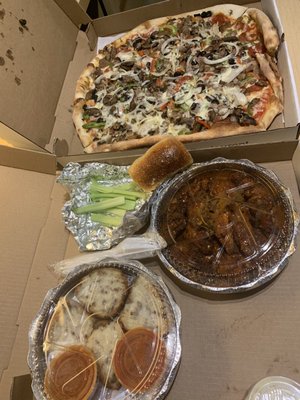 Vincent's special pizza, rice balls, and spicy chicken wings