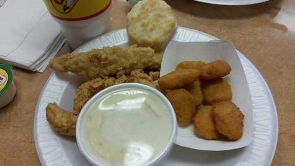 A #1 (four piece chicken tenders) with a side of corn nuggets).