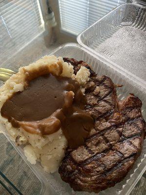 Rib eye with mashed potatoes and gravy. Delicious!!