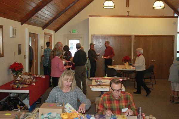 Wrapping gifts for Mountain Family Center.