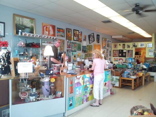 View from the door... note all the artwork on the wall behind the counter!