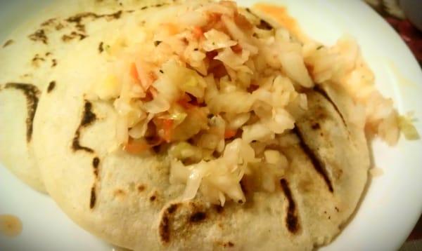 Pupusa revuelta and flower