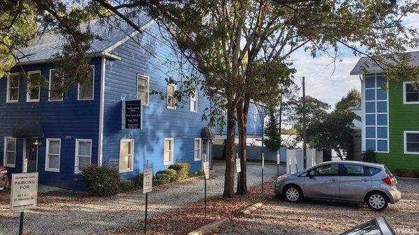 Please, park under our blue building, enter through side door dearest that carport.  Suite 300 is upstairs through the farthest right door.