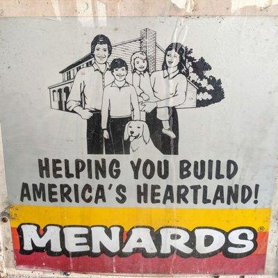 "Helping you build America's heartland!", circa early 1980s (?), on the trash can outside the main entrance