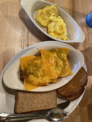 Stuffed hashbrown, eggs on the side