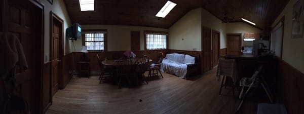 Panoramic of living room/kitchen