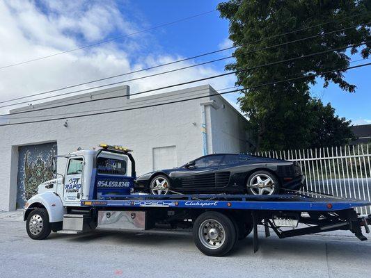 Exotic cars towing.