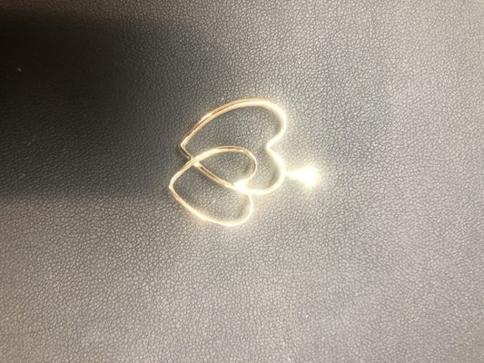 Two wedding bands made into this Heart Pendant for customer