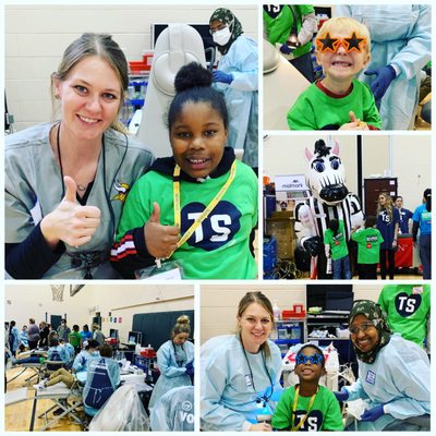 Volunteering at the Team Smiles event sponsored by the MN Vikings, providing free dental care for the kids of Lucy Laney Elementary