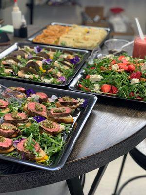 Tenderloin crostini, veggie dumplings w/ginger soy dipping sauce, shrimp tacos & salad w/ arugula/walnuts/Gorgonzola/strawberries