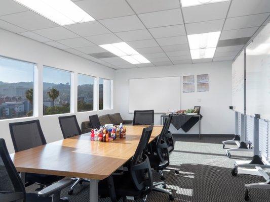 TV Writers room with lots of natural light, views, and whiteboards