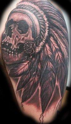 skull headdress cover-up tattoo