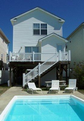 Cooper's Lighthouse is a 4 bed / 3 bath house with a private pool only 1 block from the beach!