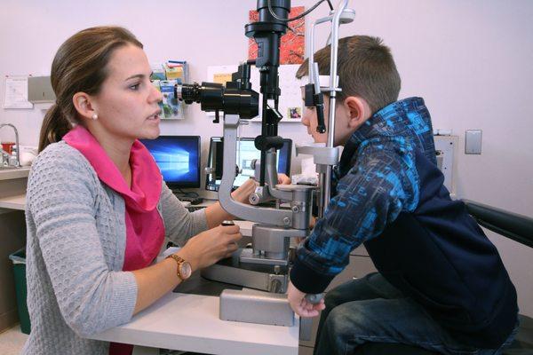 Dr. Hannis performing a pediatric eye exam