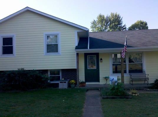 Painted this whole house from a brown to this beautiful yellow. Painted the doors also.