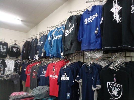 Licensed pro sports fan apparel and hats / caps.