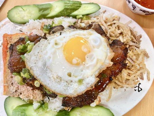 Pork shop, Pork Egg-loaf, Pork skin and sunny side up egg, fresh cucumber with broken rice.